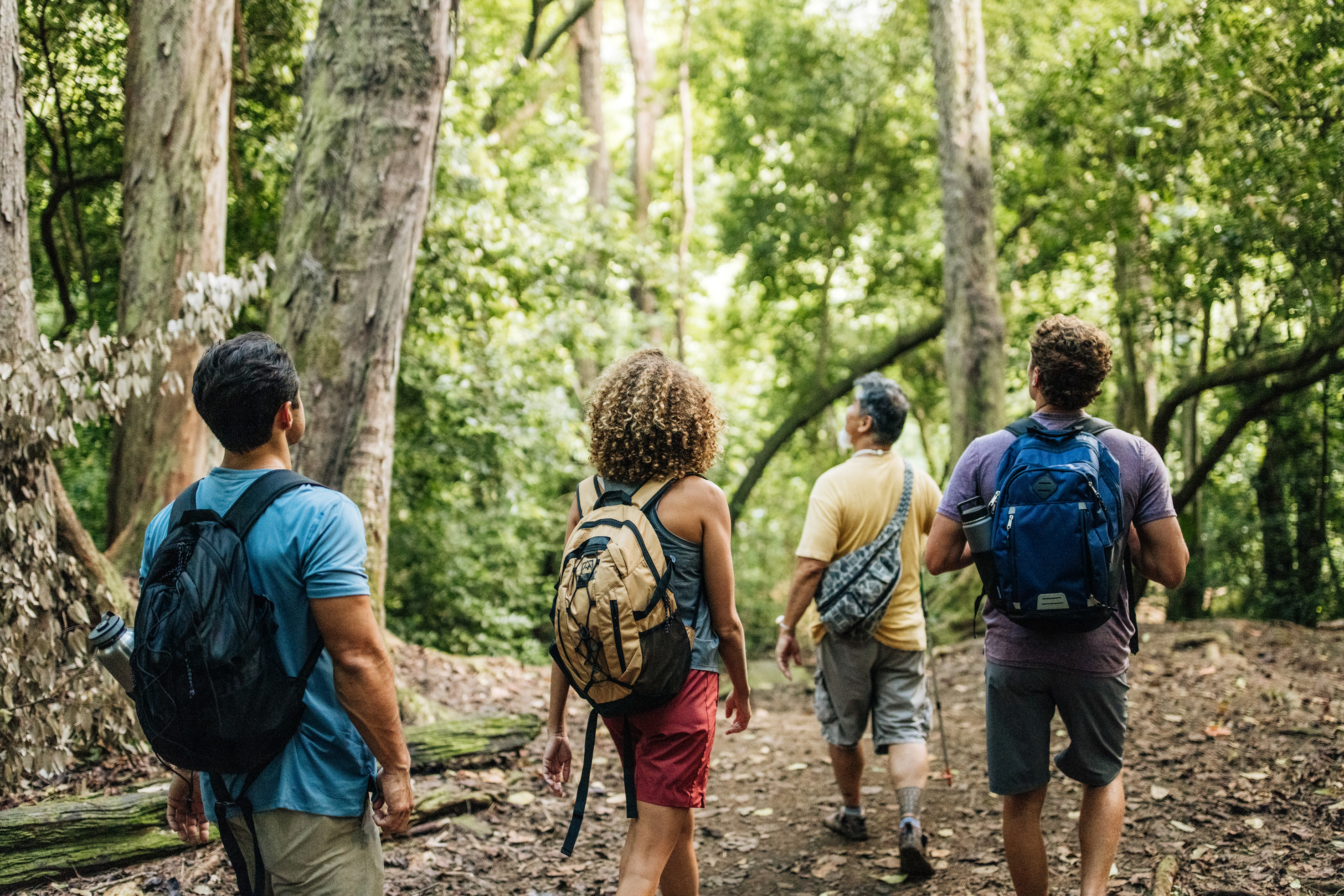 Sam Ohu Gon of The Nature Conservancy guides visitors on a hiking trail