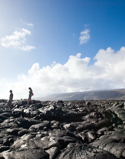 Couple walking on mountain