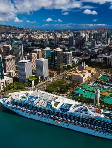 Cruise ship anchored at a port in Oʻahu